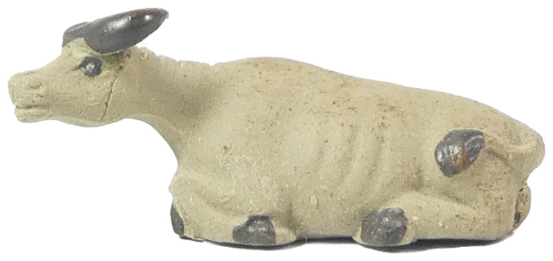 Handgearbeitete Miniatur aus gebranntem Ton.