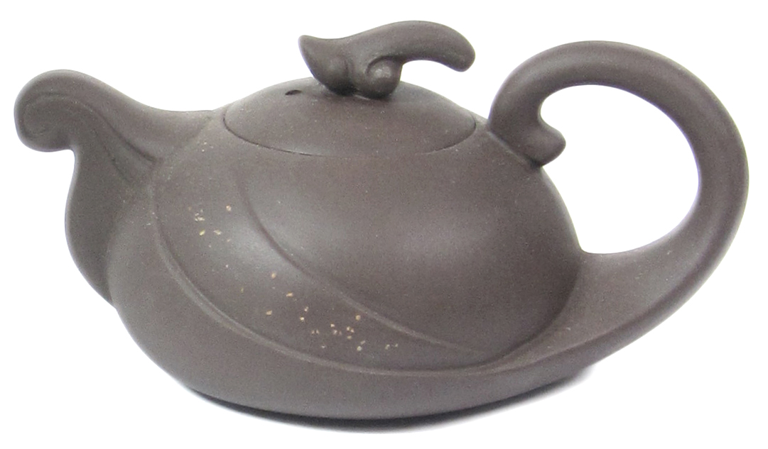 Zier-Teekanne aus gebranntem Ton. (Leichte Farbabweichungen sind möglich.)

Fassungsvermögen: ca. 100 ml

 